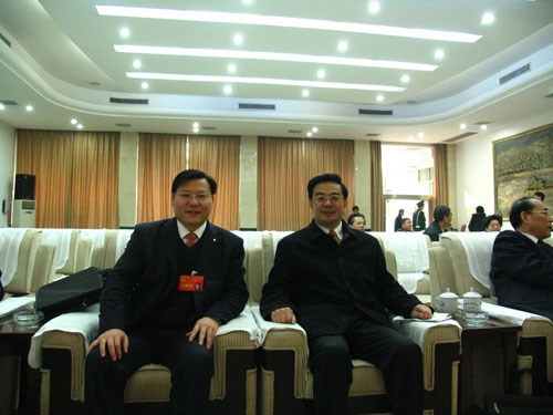 王董與最高人民法院院長、原湖南省省長周強在一起